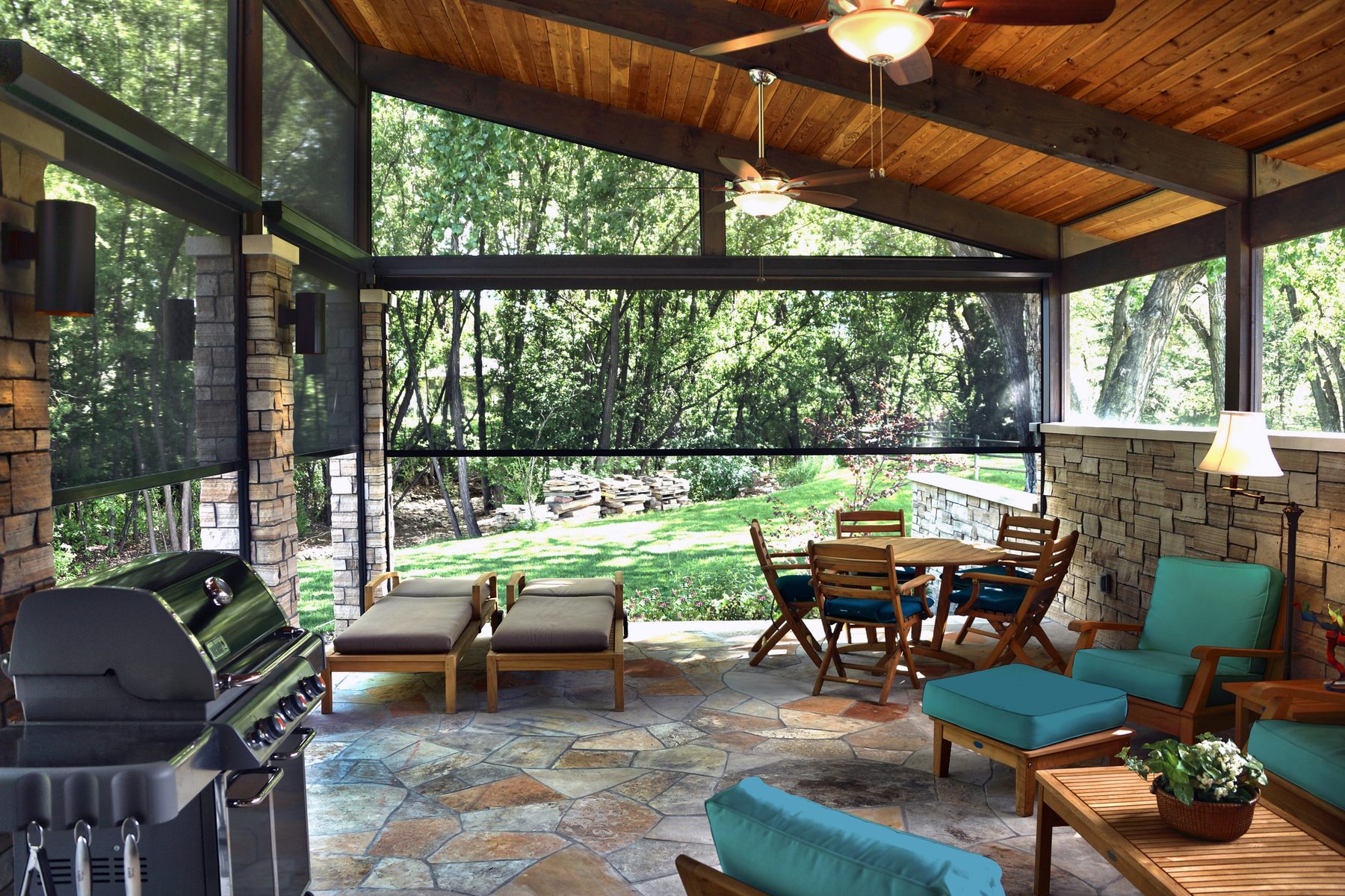 Screened porch with solar shades, ceiling fans, and an outdoor grill on a wooded lot like those in Prosper, Celina, and Gunter